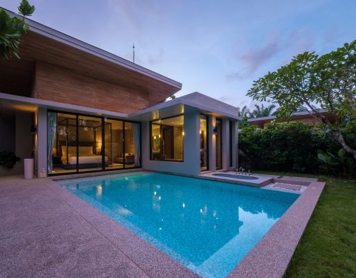 Modern house with a swimming pool, modern pool villa at the beach, luxury villa